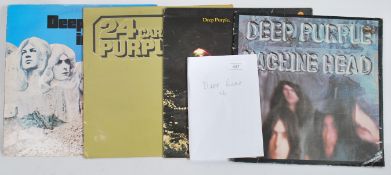 A collection of four long play Lp vinyl records by