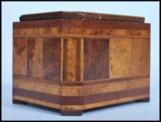 A 19th century VIctorian small walnut and sample wood marquetry tea caddy,  of octagonal form, the