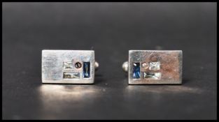 A pair of 925 silver cuff links set with CZ. Marked 925 CZ