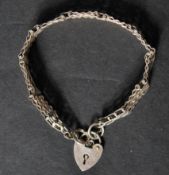 A hallmarked 925 silver heart lock fancy gate link bracelet. Hallmarked London. Weight 16g. Measures