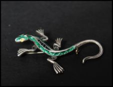 A vintage  silver brooch pin in the form of a lizard with enamel decoration having a  roller clip