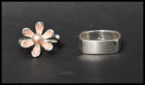 A Links of London Night Time garden ring decorated with pink enamel and set with a pink pearl,