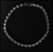 A hallmarked 925 silver tennis bracelet set with round cut hematite. Hallmarked Birmingham. Measures
