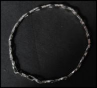 A 925 silver bracelet having pierced and star cut links. Marked SLC 925. Measures 7.5inches.