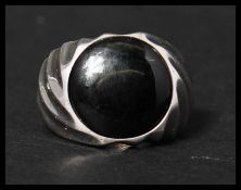 A hallmarked 925 silver large ring set with onyx. Hallmarked Birmingham. Size T