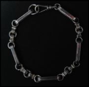 A hallmarked 925 silver book chain bracelet having a lobster claw clasp. Hallmarked Sheffield.