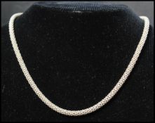 A hallmarked Milor 925 silver fancy link chain necklace. Weight 13g.  Measures 17 inches.
