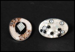 A  925 silver dress ring and pendant  both set with mother of pearl and white stones. Marked 925.