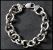 A hallmarked Italian 925 silver large polo link bracelet with lobster claw clasp. Import marks for