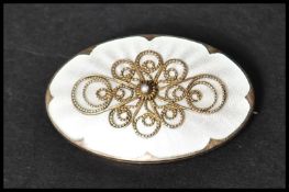 A Norwegian silver and guilloche enamel brooch pin  Marked 925s Serling Norway. Measures 4.3cms.