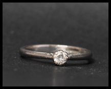A hallmarked 18ct white gold and diamond solitaire ring. Hallmarked for Birmingham. Diamond approx