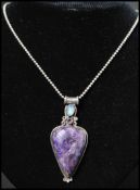 A 925 silver pendant necklace strung with a large agate pendant on a popcorn chain Marked 925. Chain
