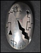 A silver 925 Aztec inspired shield / lozenge brooch having way point and lightning bolt design.