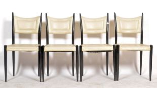 A set of 4 mid century G-Plan dining chairs in the manner of Gio Ponti. The chairs having ebonised