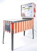 Bally pinball machine - Big Show Circus - A 1974 retro pinball machine being raised on chrome