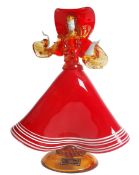 A vintage retro 20th century Murano studio art glass figurine of a lady with makers label to