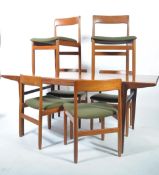 A 1970's retro teak wood Youngers dining room suite. The dining table of rectangular form having
