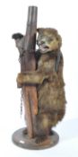 A late 19th / early 20th century Victorian taxidermy example of a dancing bear cub. Retaining