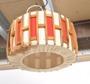 A mid century retro origina lamp shade, circa 1950's hessian and red cylinder design with fittings