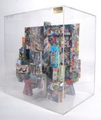 A 20th century mixed media sculpture set within a