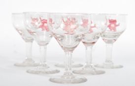 A set of six fantastic vintage 20th century Champagne glasses attributed to The Elephant Club
