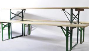 A vintage industrial / festival / garden Trestle table and two bench set with painted  pine tops and