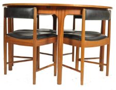 Mcintosh of Kirkcaldy - A retro 1970's teak wood extending dining table of round form raised on