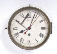 An early 20th century Smiths bulkhead clock having inset 8 day movement. The barrel cylinder case