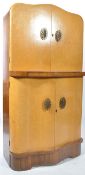 A 1930's Art Deco birds eye maple and mahogany large cocktail / drinks cabinet. Of upright form