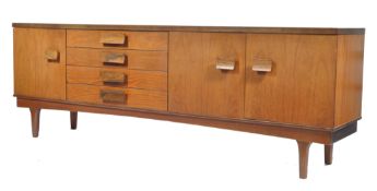 Bath Cabinet Makers - A retro 1960's teak wood sideboard having a bank of four drawers offset from