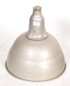 A collection of three vintage industrial pendant factory lights, two of which being enamelled in a