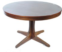 A 1970's retro Danish influenced circular / round dining table in the manner of Heltborg Møbler. The