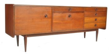 An exceptional mid century Younger's teak wood sideboard having turned and tapering angular legs