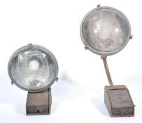 An exceptional pair of early 20th century French Industrial large wall mounted street lights from