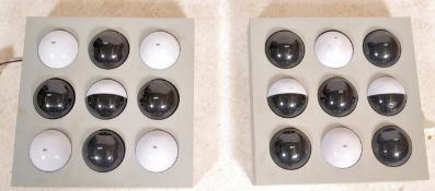 A pair of retro 20th century ' Fifty Fifty ' wall lamps. Each box with swivel on / off two tone