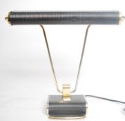 Eileen Gray - A Jumo edition art deco style desk lamp being raised on adjustable v-shaped rods