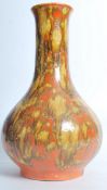 A vintage mid 20th century fat lava baluster vase of bulbous form having a waisted neck with