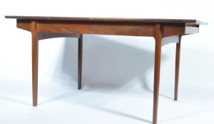 Bath Cabinet Makers - A retro 1960's extending dining table of rectangular form having a flip out
