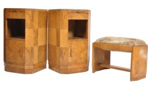A 1930's true pair of Art Deco walnut bedsides cabinets having opposite opening doors with pull