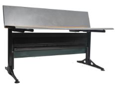 A mid 20th century retro Herman Miller Swivel ' Action ' Desk in the manner of George Nelson. The