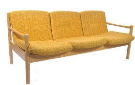 A rare pair of 20th century Ercol ' Staff ' sofa settee's. Each 3 seat sofa having turned legs