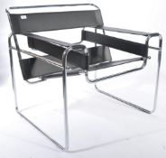After Marcel Bruer - A b3 Wassilly club chair. The chair being made of a chrome tubular frame and