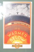A vintage 20th century reproduction London Underground travel poster It Is Warmer Below depicting