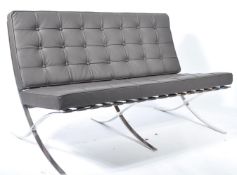 After Mies van der Rohe - A Barcelona type two seater settee / sofa. The design is formed from a