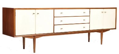 A retro mid century / circa 1960`s Everest teak sideboard dresser of large form. The rectangular top