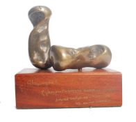 A 20th century bronze sculpture by David Morris. The mahogany plinth entitled ' Shlumpers ' Phosphur