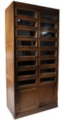 An early 20th century light oak shop display haber