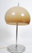 A 20th century modernist 1970's retro circular chrome based table lamp with opaque mushroom glass