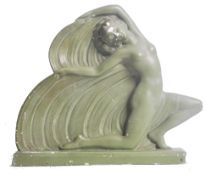 A 1930's Art Deco chalkware and verdigris painted  scupture figure depicting an erotic naken