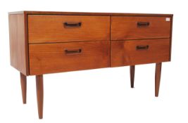 A 1970's Danish influenced teak wood sideboard of Danish influence having a series of short